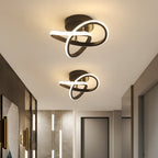 Moderne LED-Deckenleuchte mit verschlungenen Leuchtringen