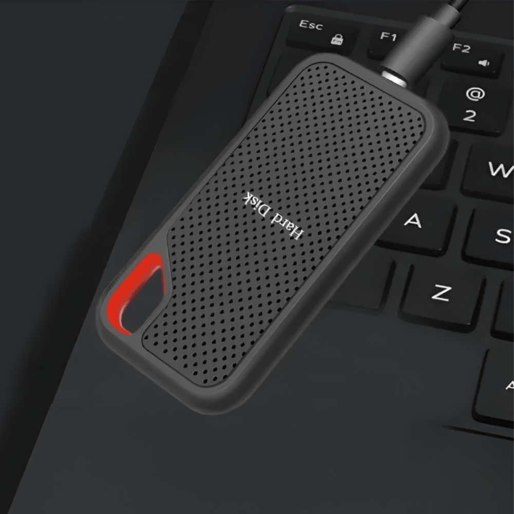 Tragbare schwarze externe SSD mit roter Trageöffnung und USB-C-Anschluss